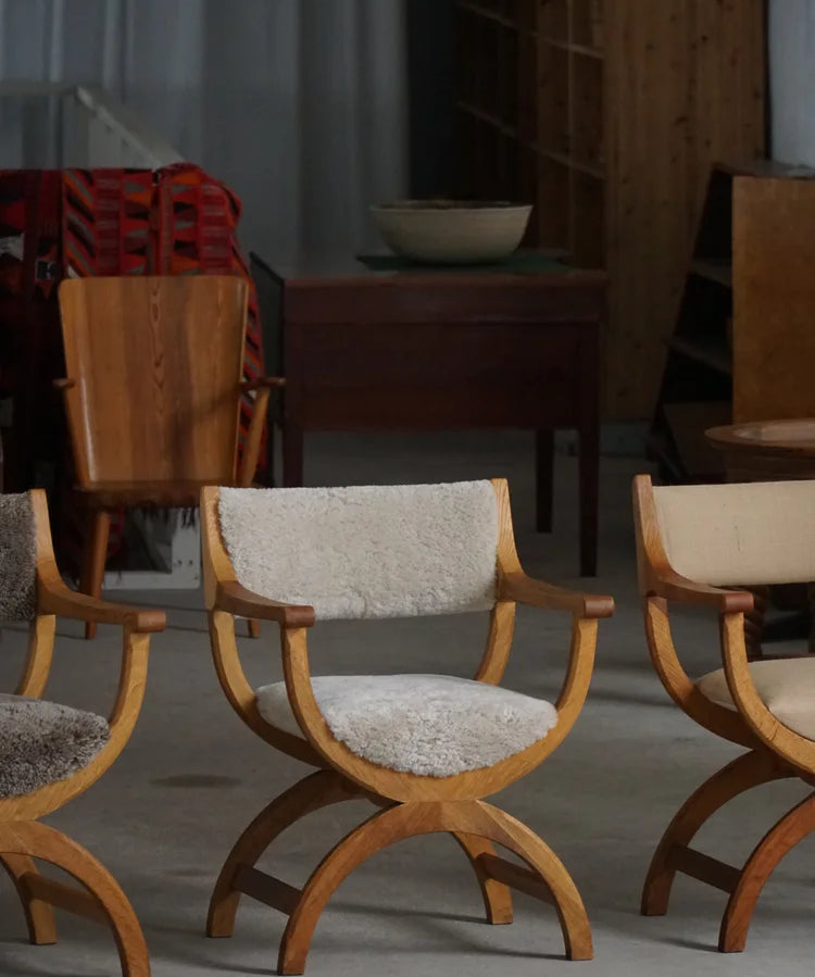 Henning_Kjærnulf_‘Kurul’_Armchair_in_Oak_and_Lambswool,_Danish_Modern_Design