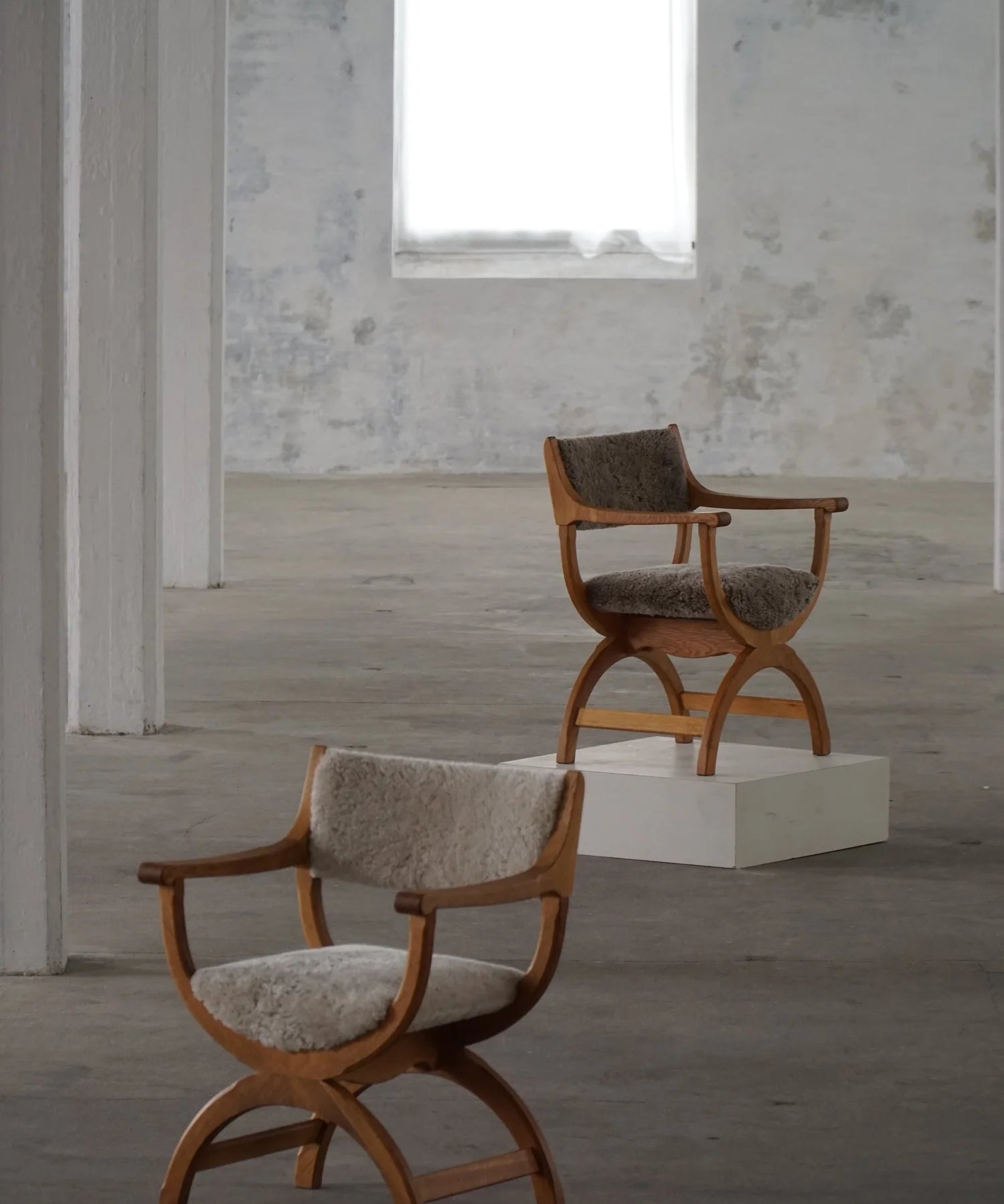 Henning_Kjærnulf_‘Kurul’_Armchair_in_Oak_and_Lambswool,_Danish_Modern_Design