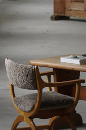 Henning_Kjærnulf_‘Kurul’_Armchair_in_Oak_and_Lambswool,_Danish_Modern_Design