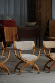 Henning_Kjærnulf_‘Kurul’_Armchair_in_Oak_and_Lambswool,_Danish_Modern_Design