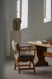 Henning_Kjærnulf_‘Kurul’_Armchair_in_Oak_and_Lambswool,_Danish_Modern_Design