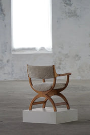 Henning_Kjærnulf_‘Kurul’_Armchair_in_Oak_and_Lambswool,_Danish_Modern_Design