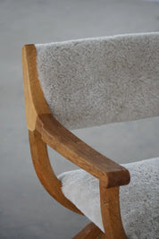 Henning_Kjærnulf_‘Kurul’_Armchair_in_Oak_and_Lambswool,_Danish_Modern_Design