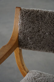 Henning_Kjærnulf_‘Kurul’_Armchair_in_Oak_and_Lambswool,_Danish_Modern_Design