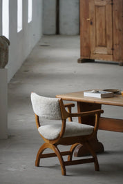 Henning_Kjærnulf_‘Kurul’_Armchair_in_Oak_and_Lambswool,_Danish_Modern_Design