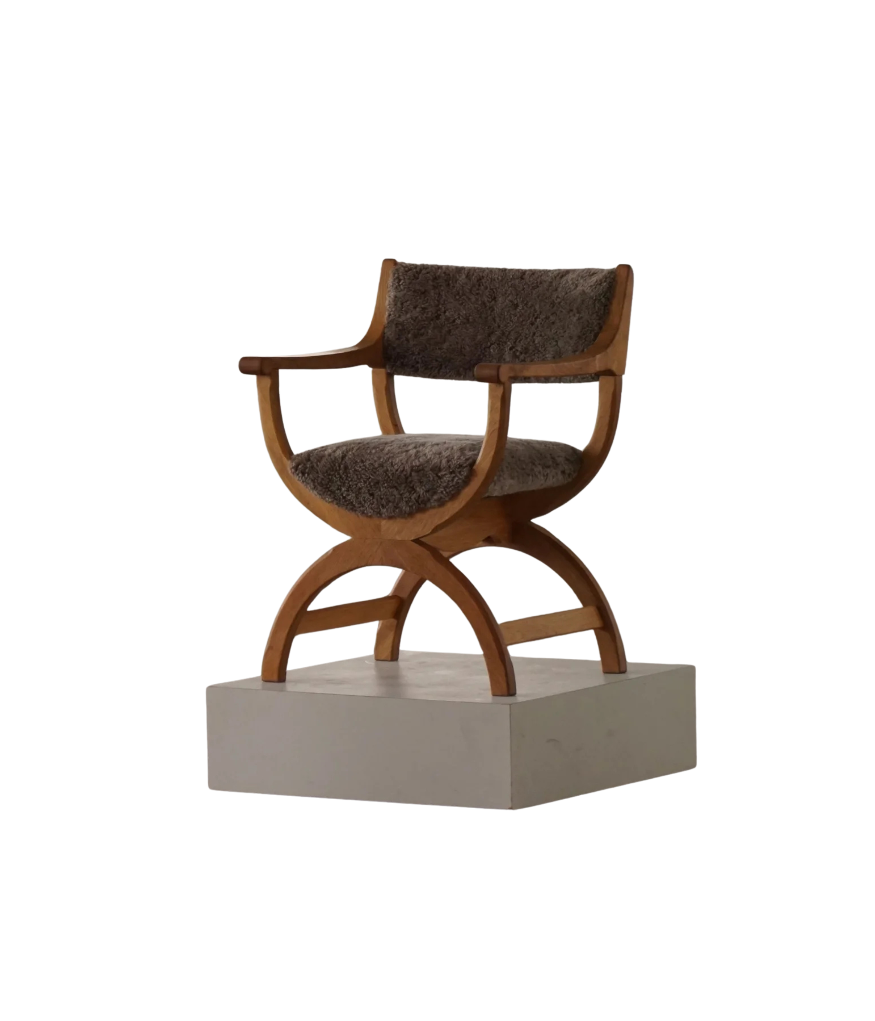 Henning_Kjærnulf_‘Kurul’_Armchair_in_Oak_and_Lambswool,_Danish_Modern_Design