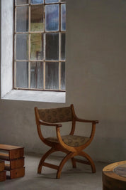 Henning_Kjærnulf_‘Kurul’_Armchair_in_Oak_with_Lisa_Larson_Textile