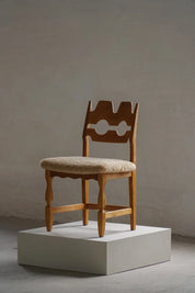 Henning_Kjærnulf_Razorblade_Dining_Chair_in_Oak_and_Lambswool,_Denmark,_1960s