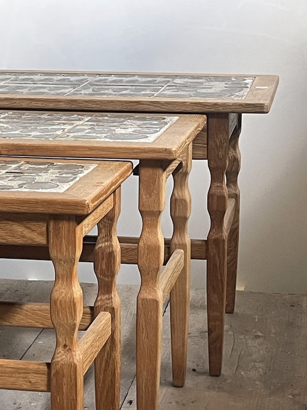 Set_of_3_Henning_Kjærnulf_Nesting_Tables_for_EG_Kvalitetsmøbel_in_Solid_Oak_and_Ceramic_Tile,_Denmark,_1960s