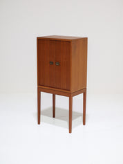Henning_Korch_pipe_/_bar_cabinet_teak_Danish_1960s
