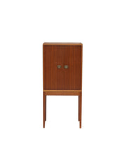 Henning_Korch_pipe_/_bar_cabinet_teak_Danish_1960s