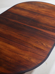 Henry_Rosengren_Hansen_Extendable_Rosewood_Dining_Table_for_Brande_Møbelindustri,_Denmark_1960s
