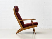 Set_of_High_armchair_and_ottoman_from_the_GE290_series_by_Hans_J._Wegner_for_Getama