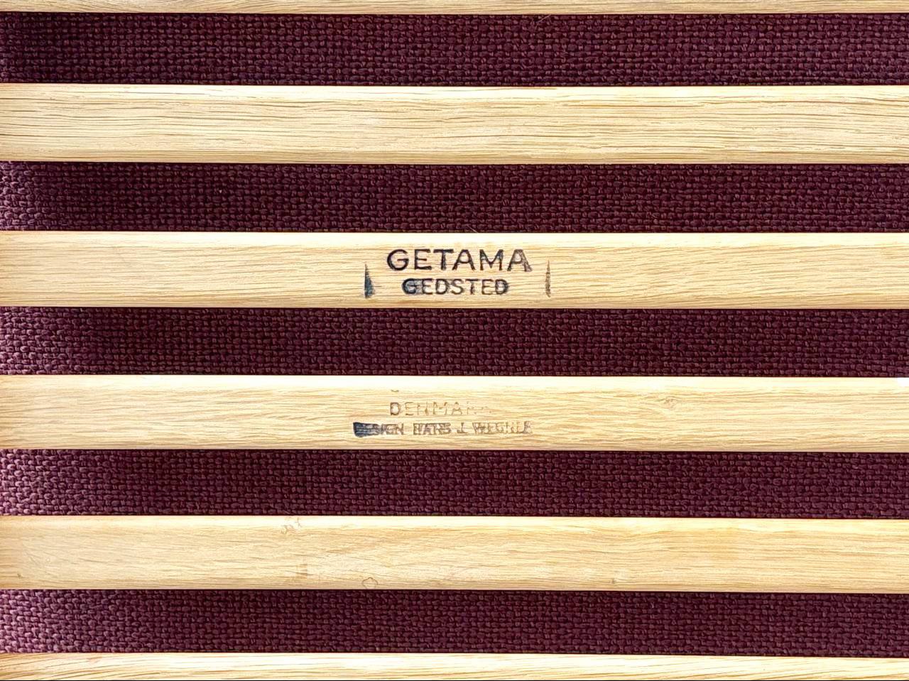 Set_of_High_armchair_and_ottoman_from_the_GE290_series_by_Hans_J._Wegner_for_Getama