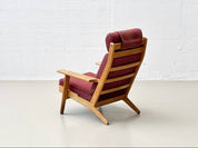 Set_of_High_armchair_and_ottoman_from_the_GE290_series_by_Hans_J._Wegner_for_Getama