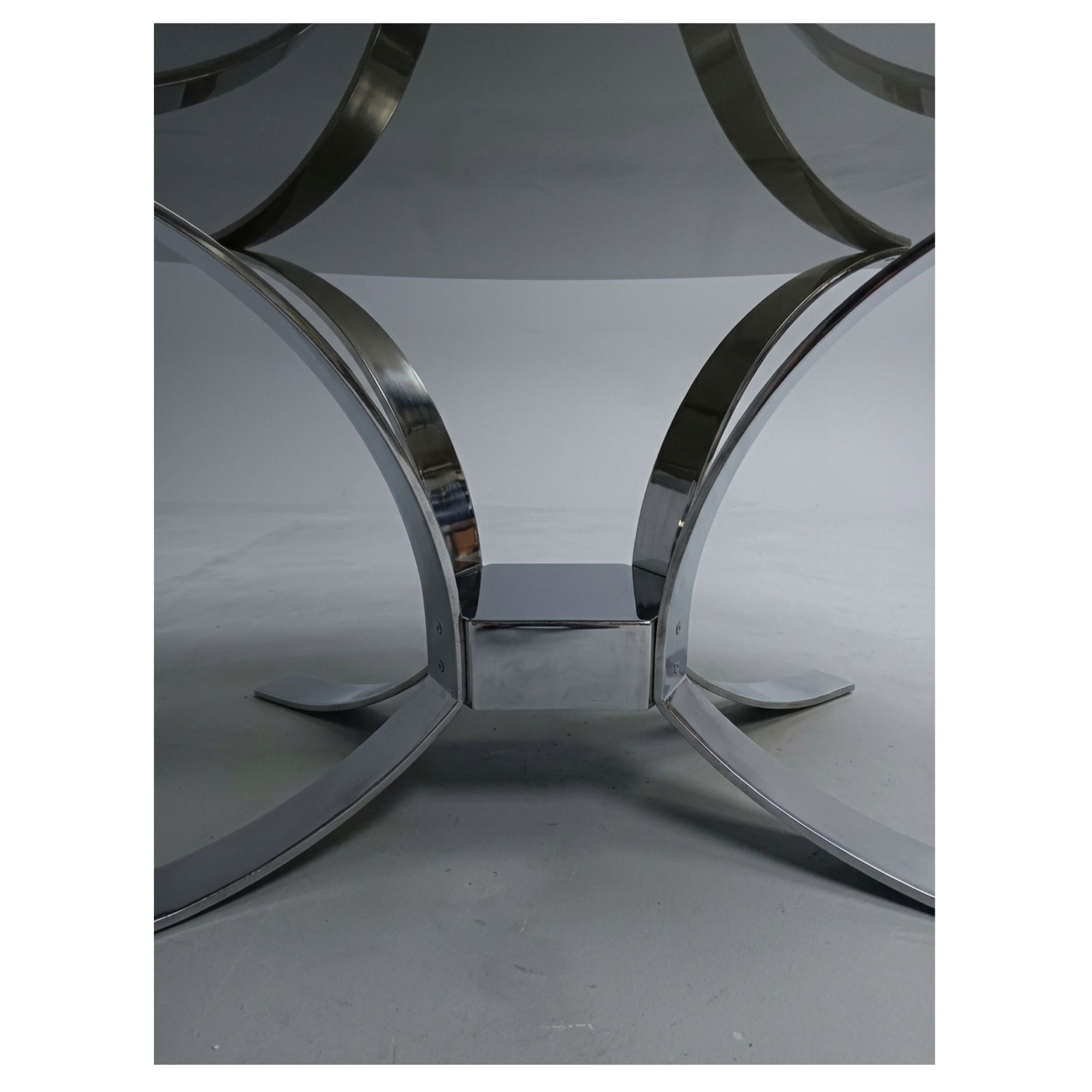 Sculptural_Chrome_and_Smoked_Glass_Dining_Table,_1970s