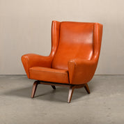 Illum_Wikkelsø_Model_110_Wingback_Armchair_in_Cognac_Leather,_Denmark