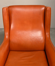 Illum_Wikkelsø_Model_110_Wingback_Armchair_in_Cognac_Leather,_Denmark
