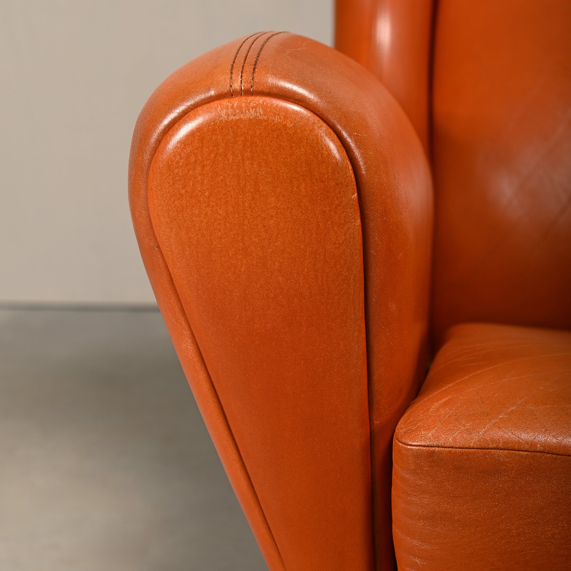 Illum_Wikkelsø_Model_110_Wingback_Armchair_in_Cognac_Leather,_Denmark
