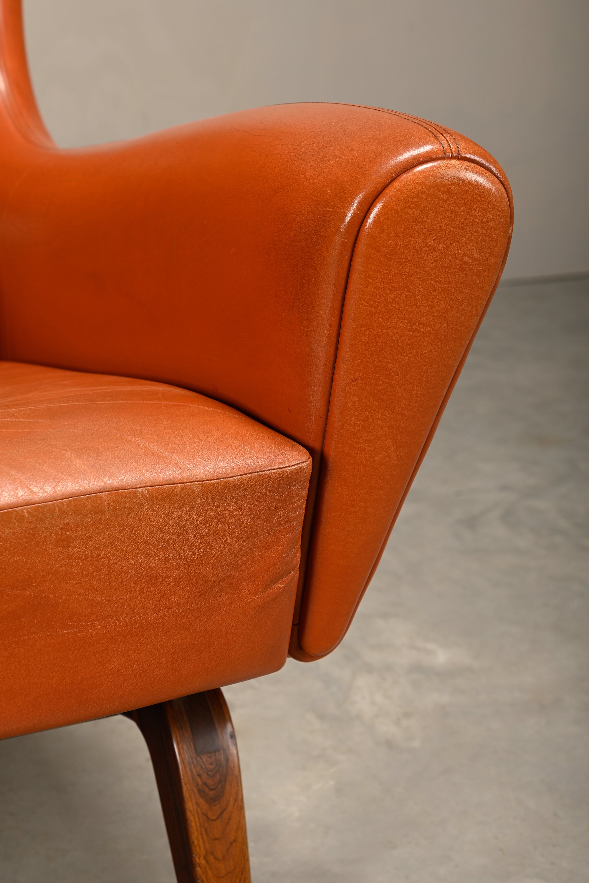 Illum_Wikkelsø_Model_110_Wingback_Armchair_in_Cognac_Leather,_Denmark