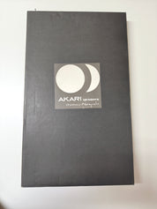 Isamu_Noguchi_Akari_2P_lamp_for_Akari_Associates,_1980s