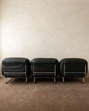 Set_of_3_Italian_Modernist_Lounge_Chairs_in_Black_Leather_and_Chrome,_1980s