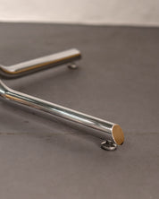 Round_Dining_Table_made_of_Tubular_Chrome_Steel_and_Smoked_Glass