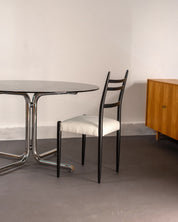 Round_Dining_Table_made_of_Tubular_Chrome_Steel_and_Smoked_Glass