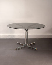 Round_Dining_Table_made_of_Tubular_Chrome_Steel_and_Smoked_Glass