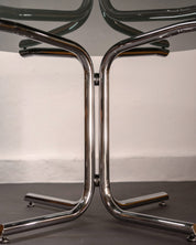 Round_Dining_Table_made_of_Tubular_Chrome_Steel_and_Smoked_Glass