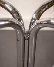 Round_Dining_Table_made_of_Tubular_Chrome_Steel_and_Smoked_Glass