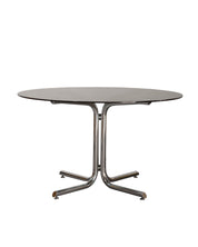 Round_Dining_Table_made_of_Tubular_Chrome_Steel_and_Smoked_Glass