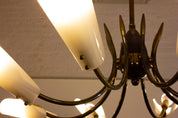 Italian_Spider_Chandelier_with_Eight_Brass_Arms_and_White_Shades,_1970s