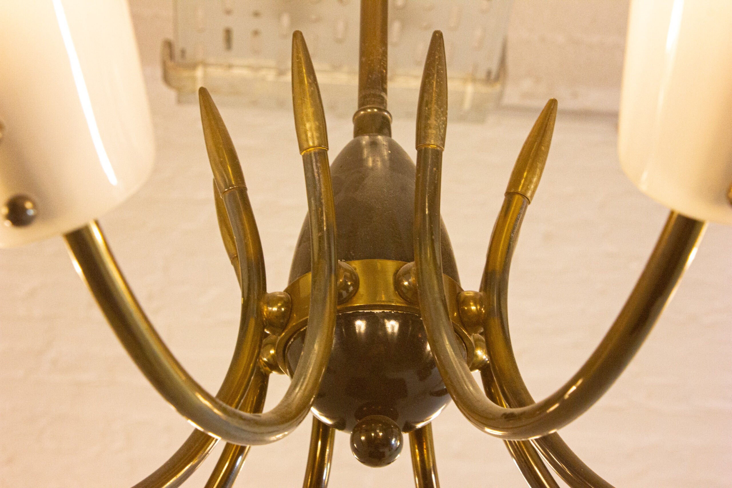 Italian_Spider_Chandelier_with_Eight_Brass_Arms_and_White_Shades,_1970s