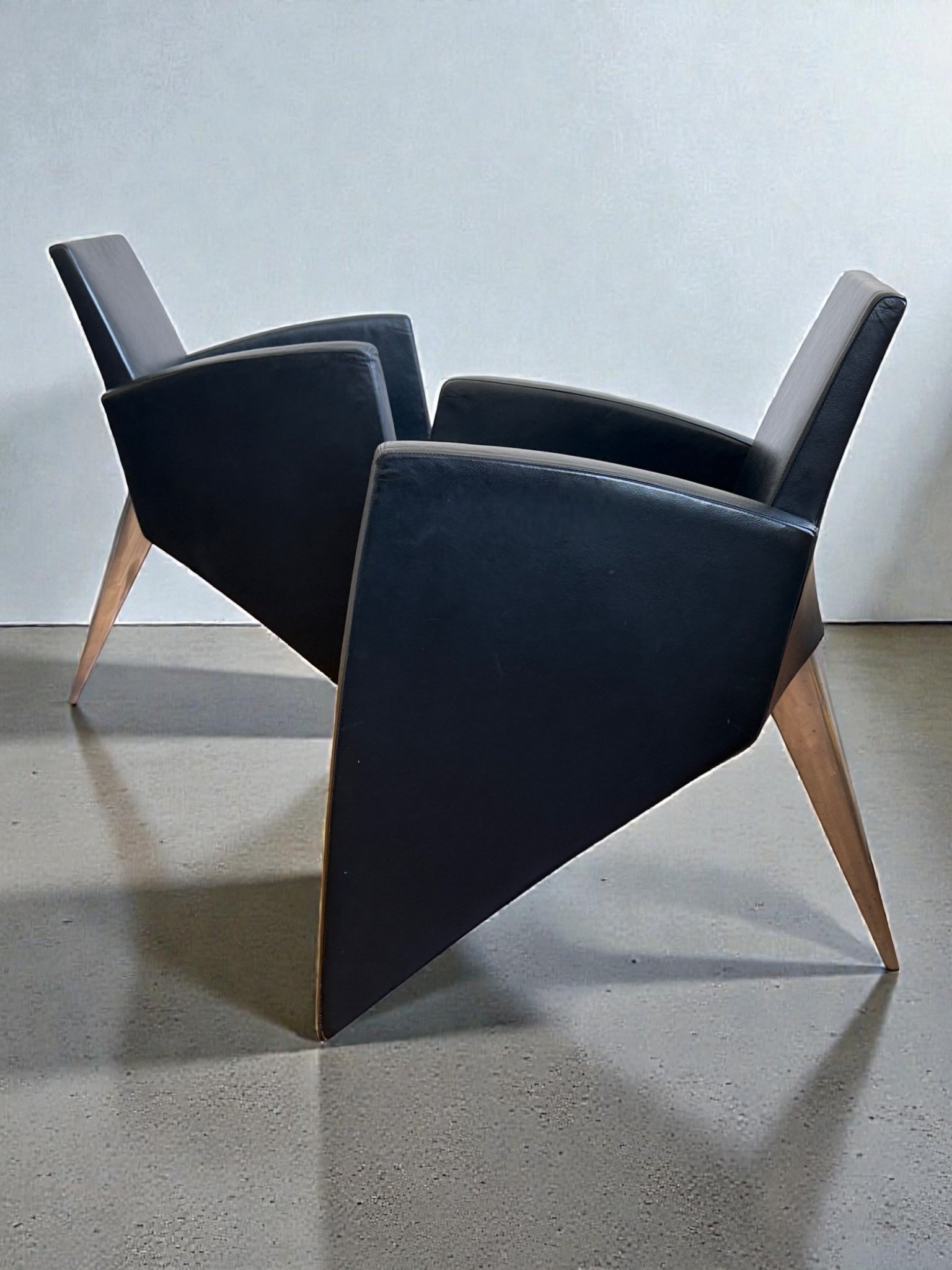 Set_of_2_J._Lang_armchairs_by_Philippe_Starck_for_Aleph,_1989