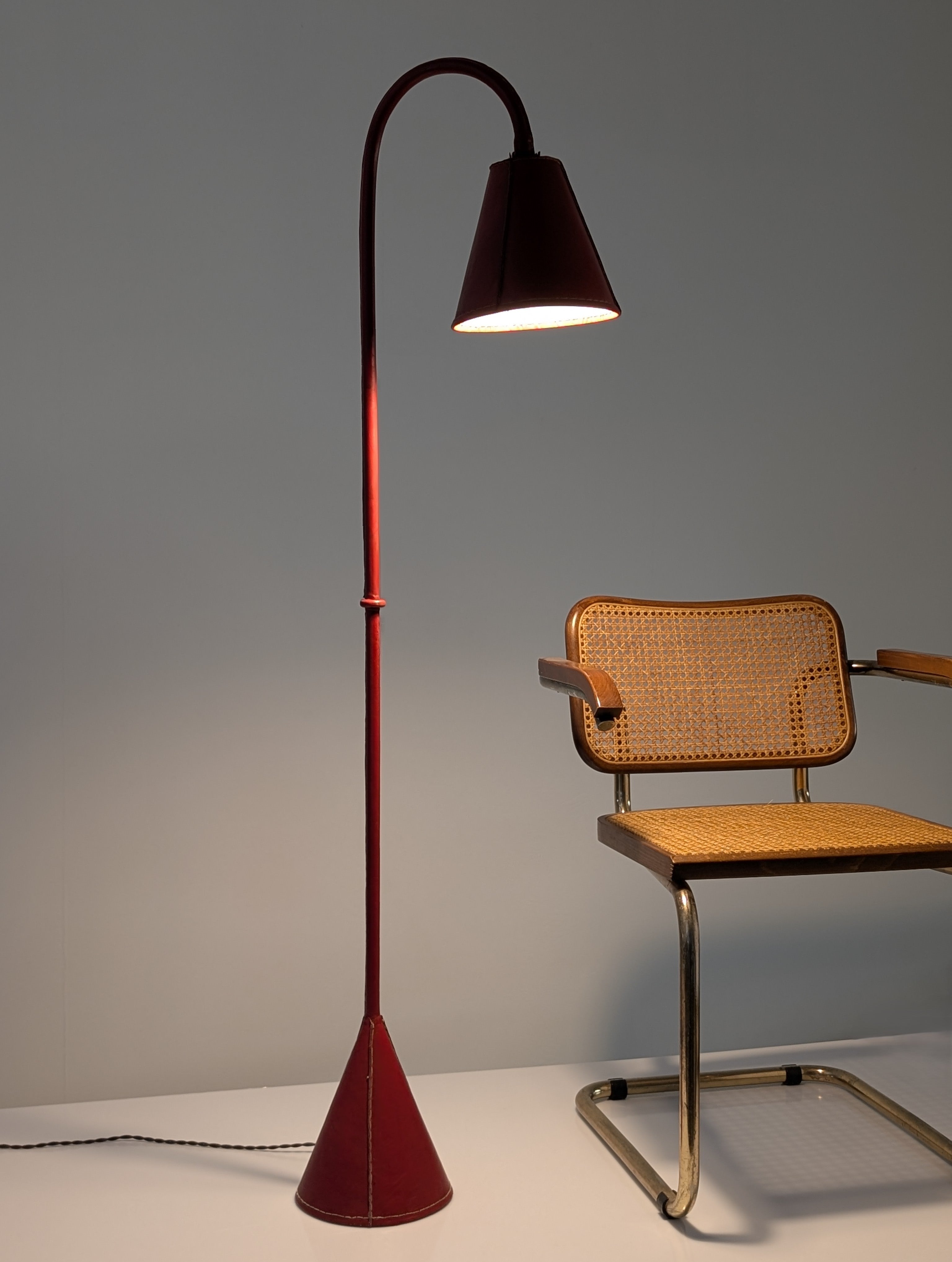 Jacques_Adnet_Floor_Lamp_in_Stitched_Red_Saddle_Leather,_France,_1960s