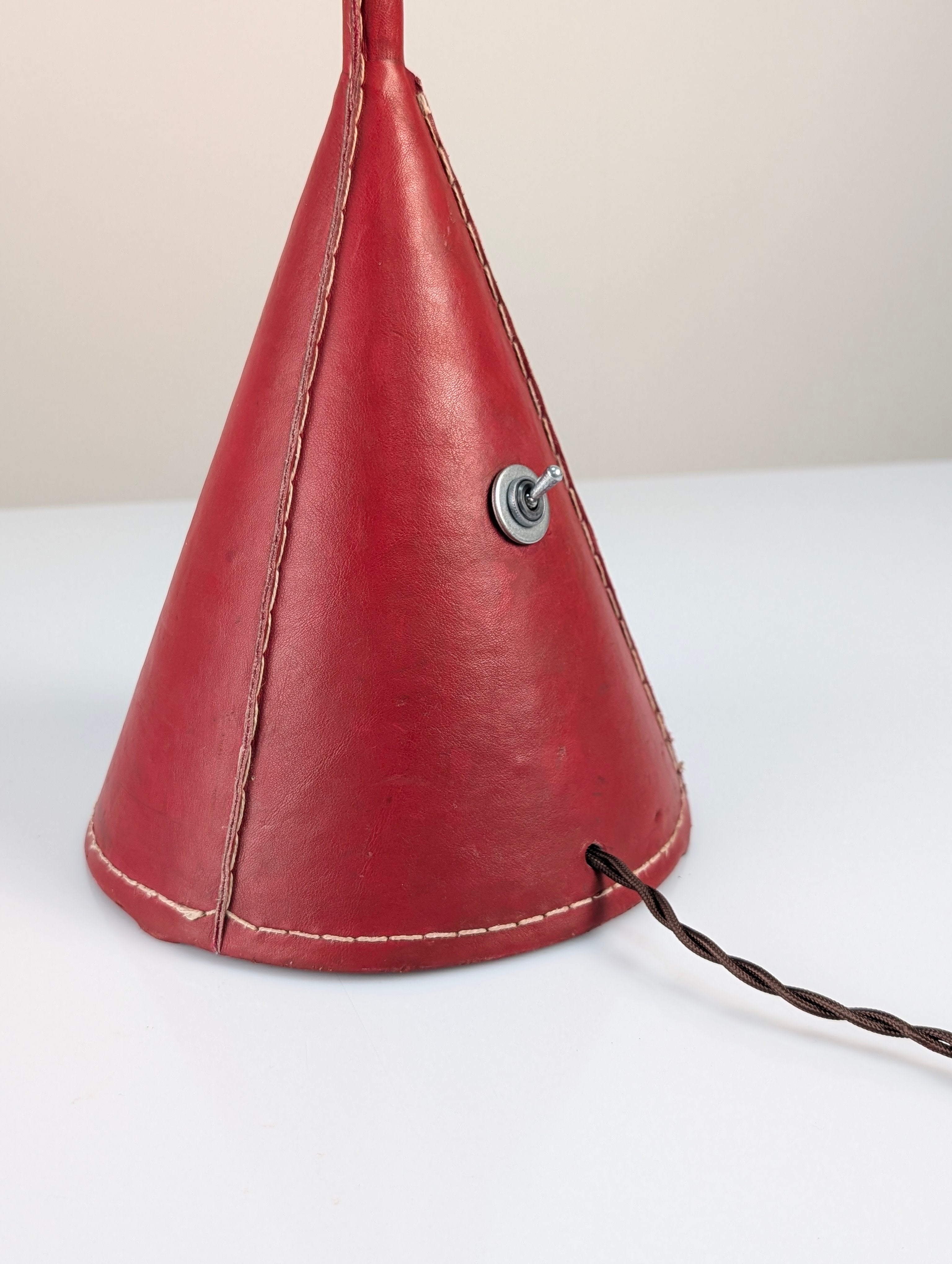 Jacques_Adnet_Floor_Lamp_in_Stitched_Red_Saddle_Leather,_France,_1960s