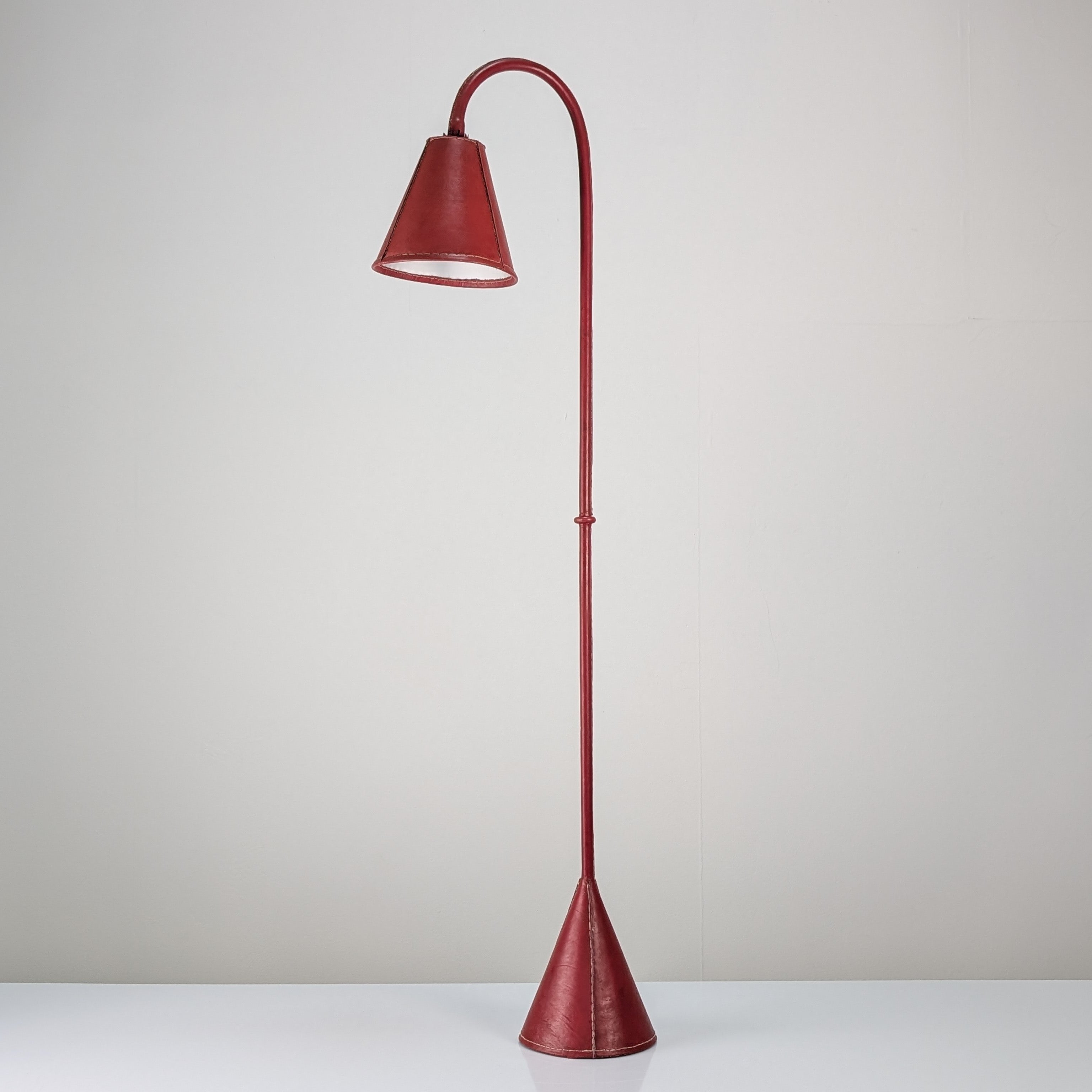 Jacques_Adnet_Floor_Lamp_in_Stitched_Red_Saddle_Leather,_France,_1960s
