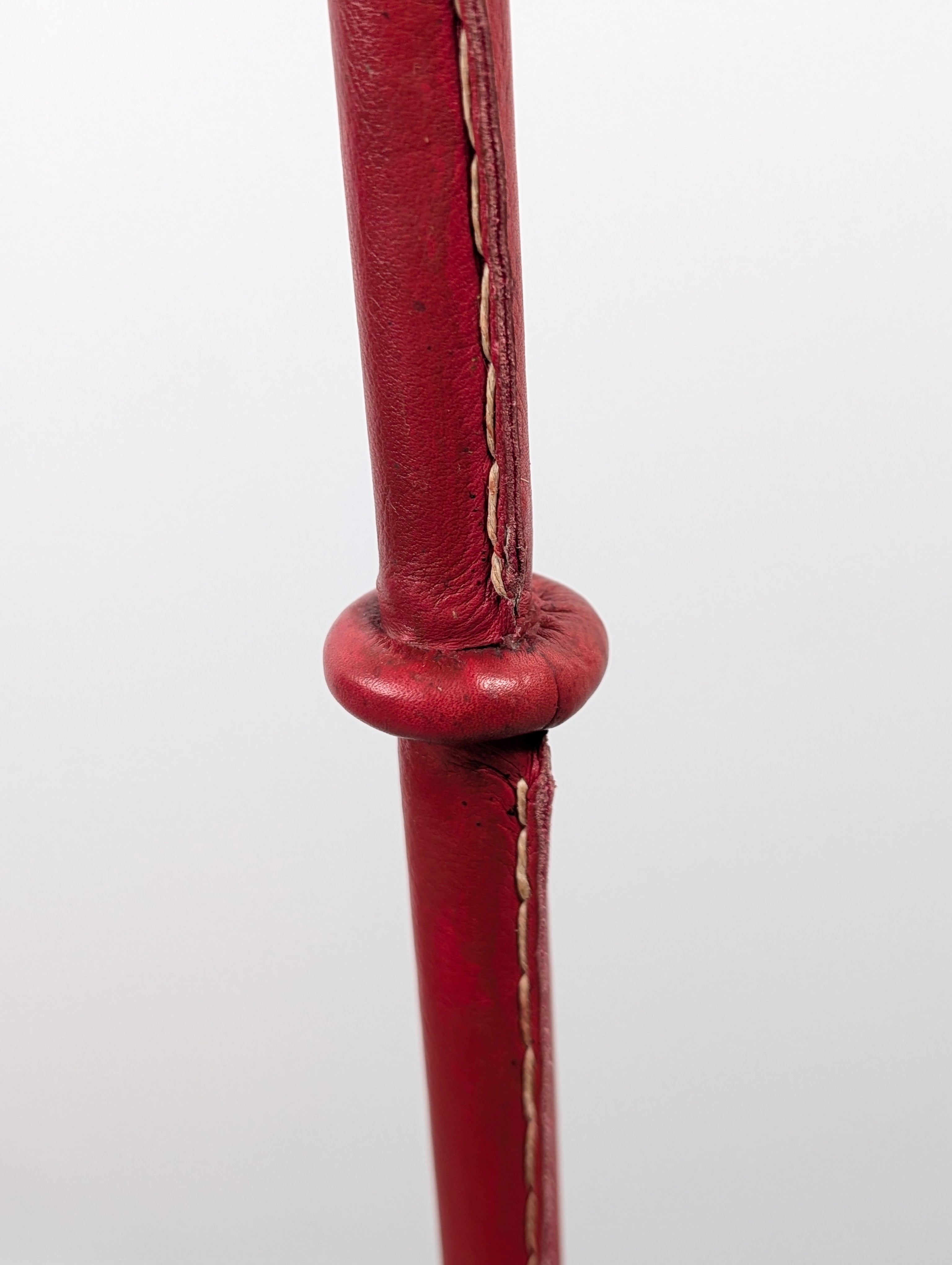 Jacques_Adnet_Floor_Lamp_in_Stitched_Red_Saddle_Leather,_France,_1960s