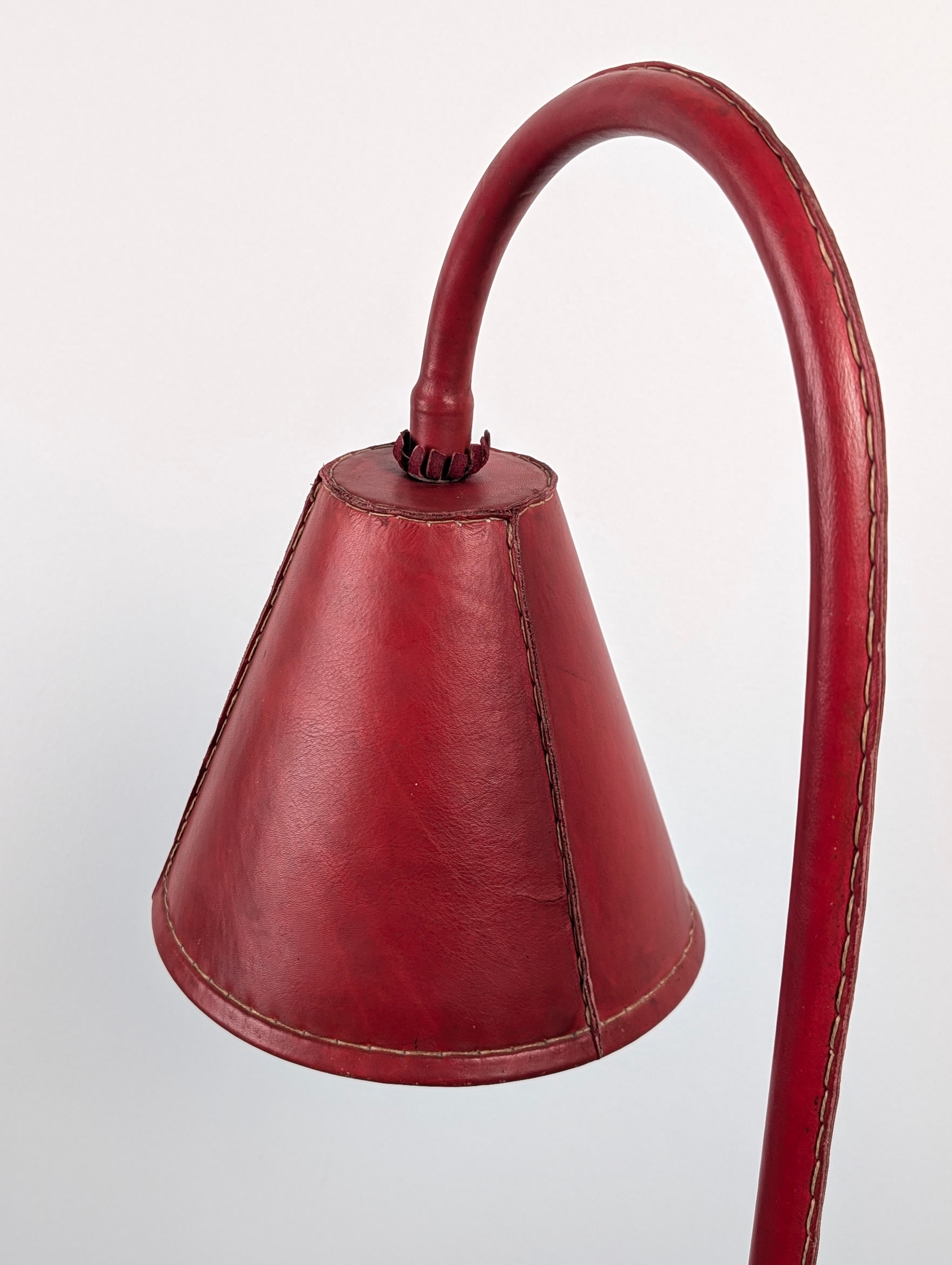 Jacques_Adnet_Floor_Lamp_in_Stitched_Red_Saddle_Leather,_France,_1960s