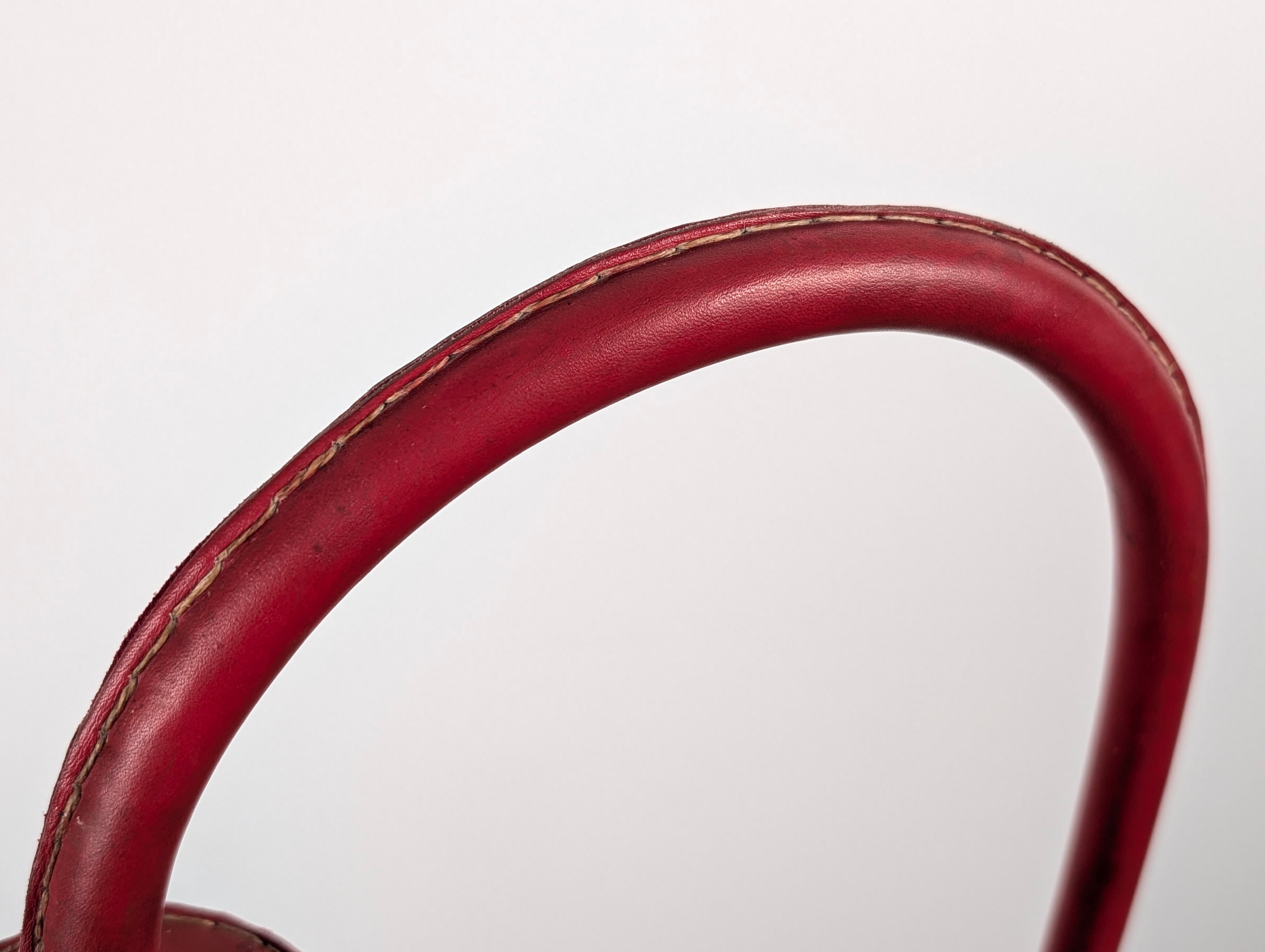 Jacques_Adnet_Floor_Lamp_in_Stitched_Red_Saddle_Leather,_France,_1960s