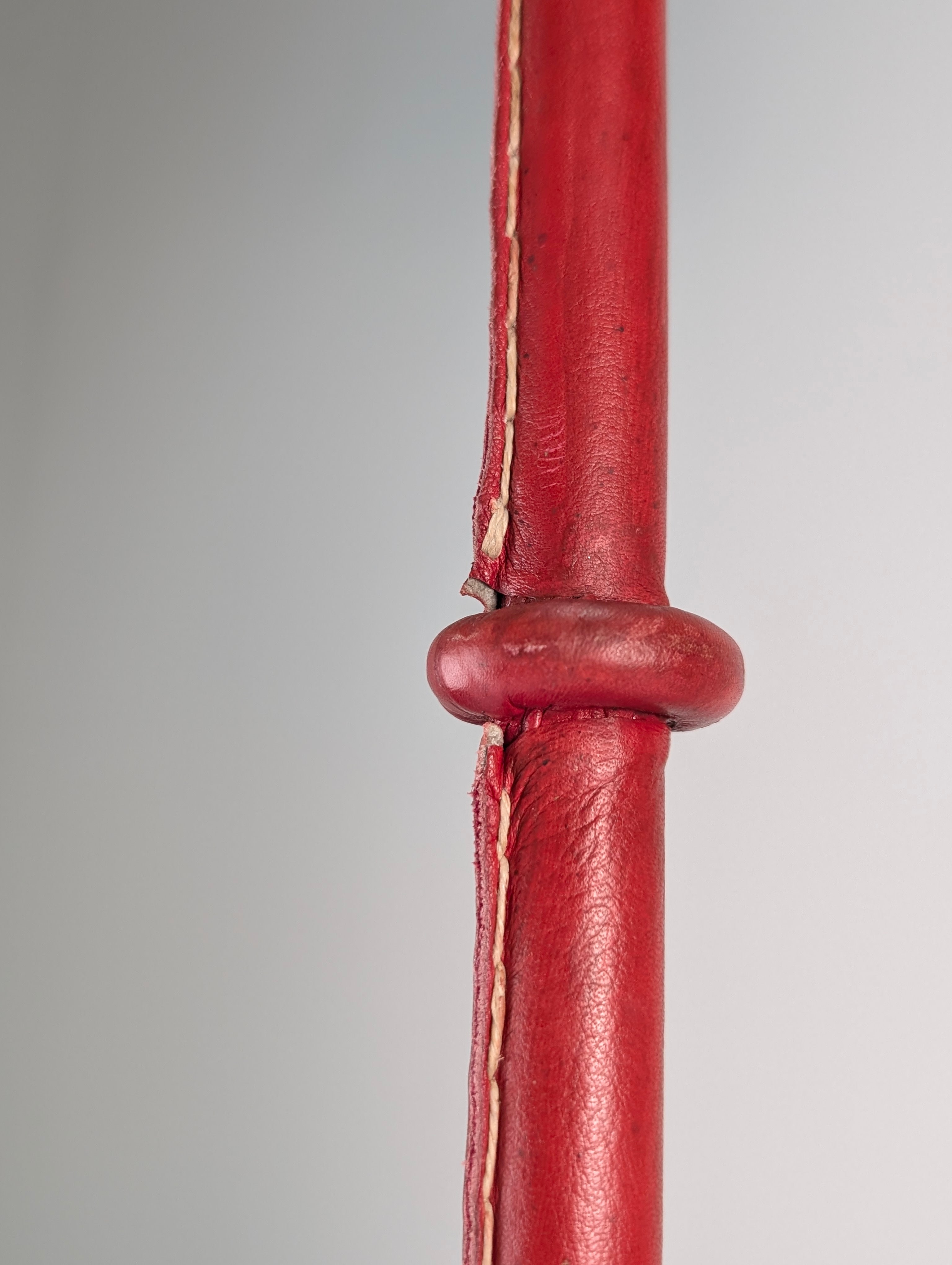 Jacques_Adnet_Floor_Lamp_in_Stitched_Red_Saddle_Leather,_France,_1960s