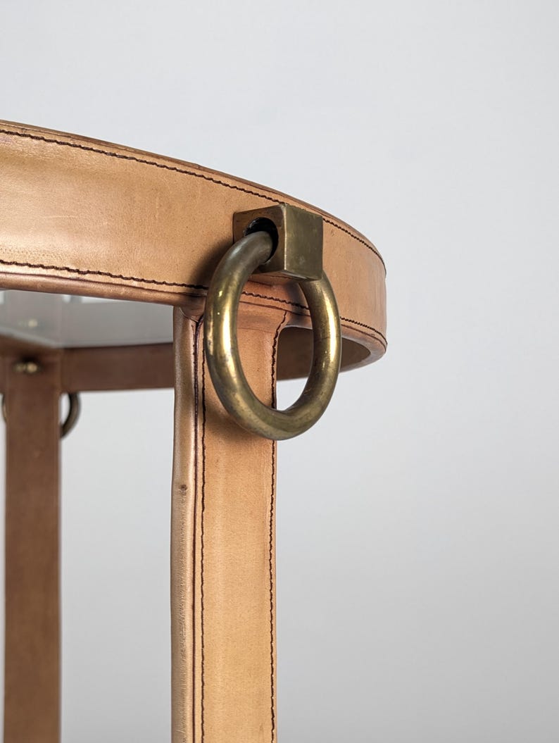 Leather_coffee_table_in_Jacques_Adnet_style