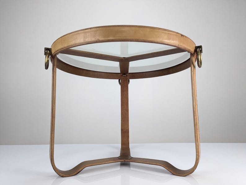 Leather_coffee_table_in_Jacques_Adnet_style