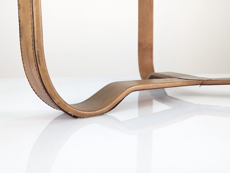 Leather_coffee_table_in_Jacques_Adnet_style