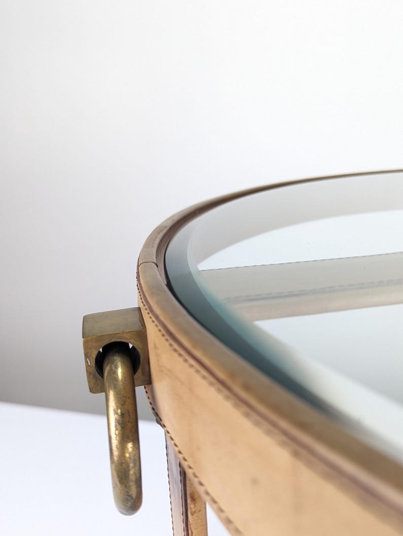 Leather_coffee_table_in_Jacques_Adnet_style