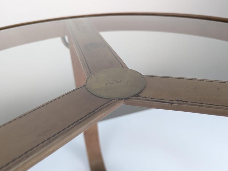 Leather_coffee_table_in_Jacques_Adnet_style