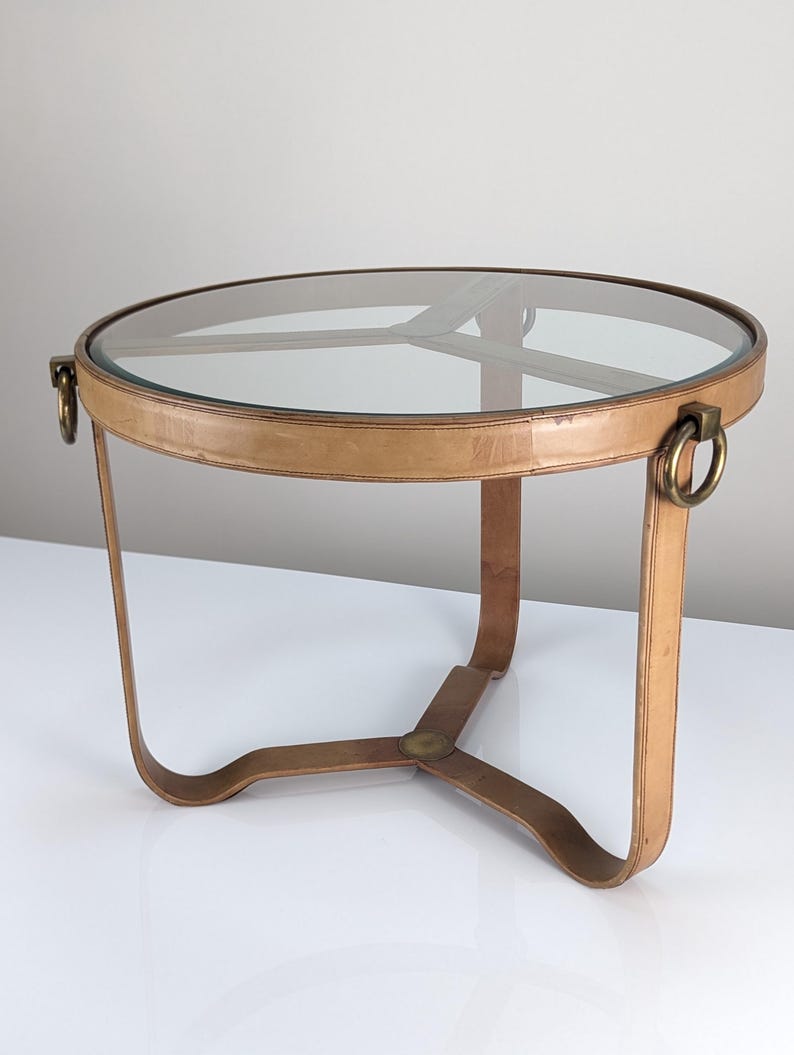 Leather_coffee_table_in_Jacques_Adnet_style