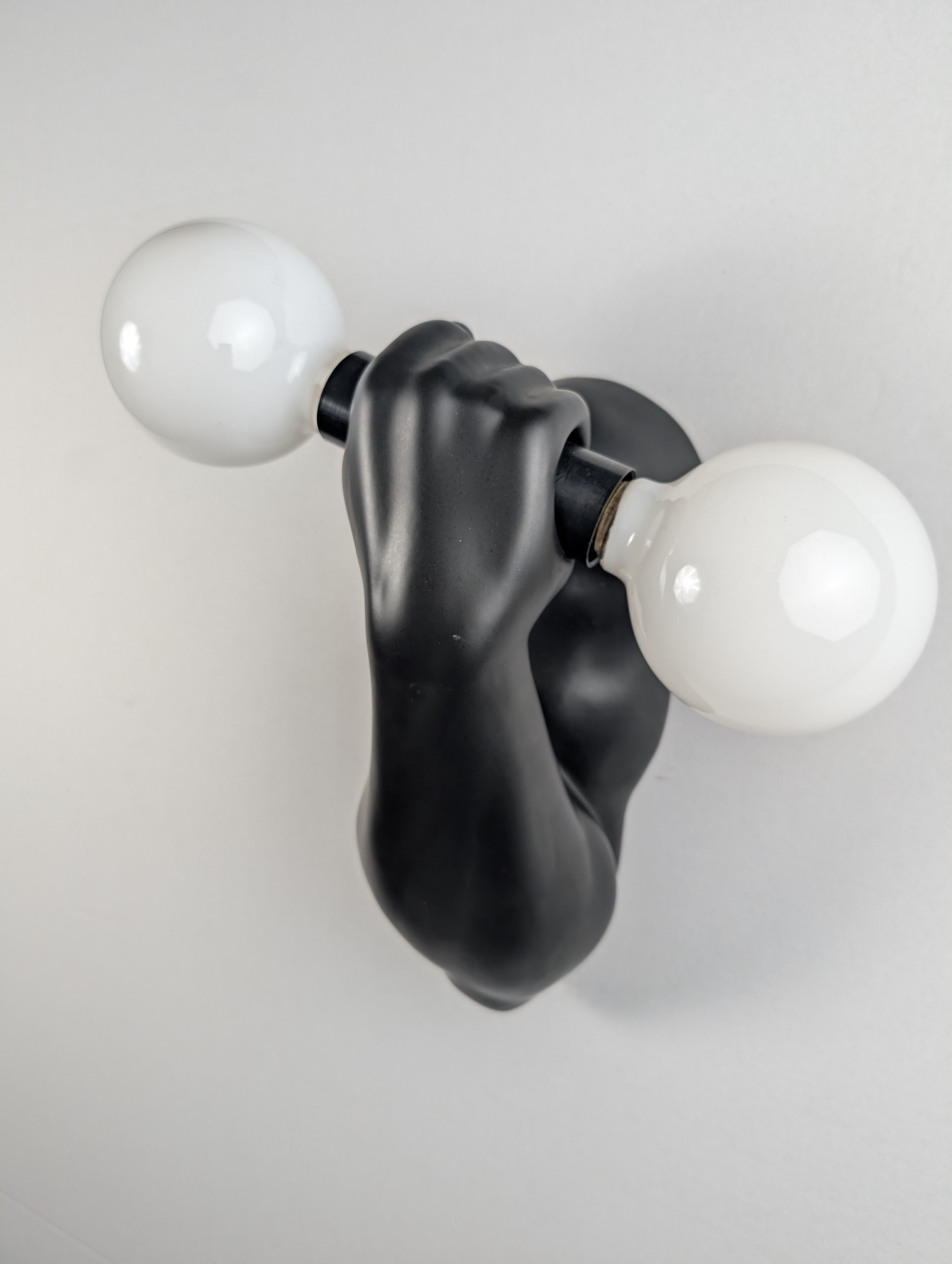 Black_Ceramic_Arm_Wall_Sconce_by_J.C._Peiré,_Sculptural_Design,_1970s,_France