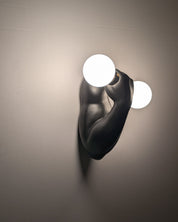 Black_Ceramic_Arm_Wall_Sconce_by_J.C._Peiré,_Sculptural_Design,_1970s,_France
